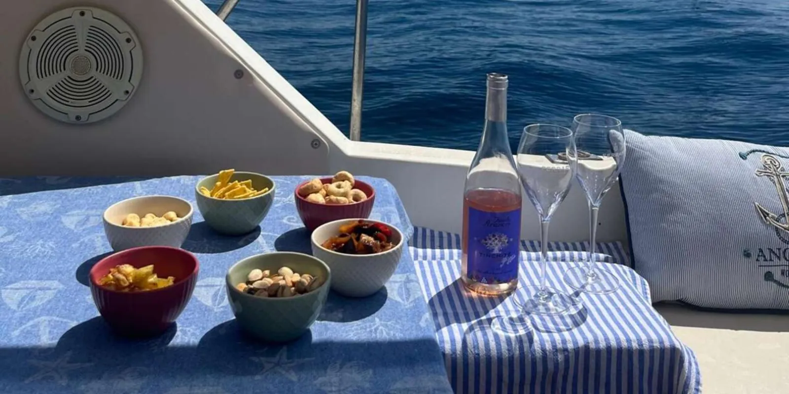 Sunset colors over the Ionian Sea during the two-hour Aci Trezza boat tour