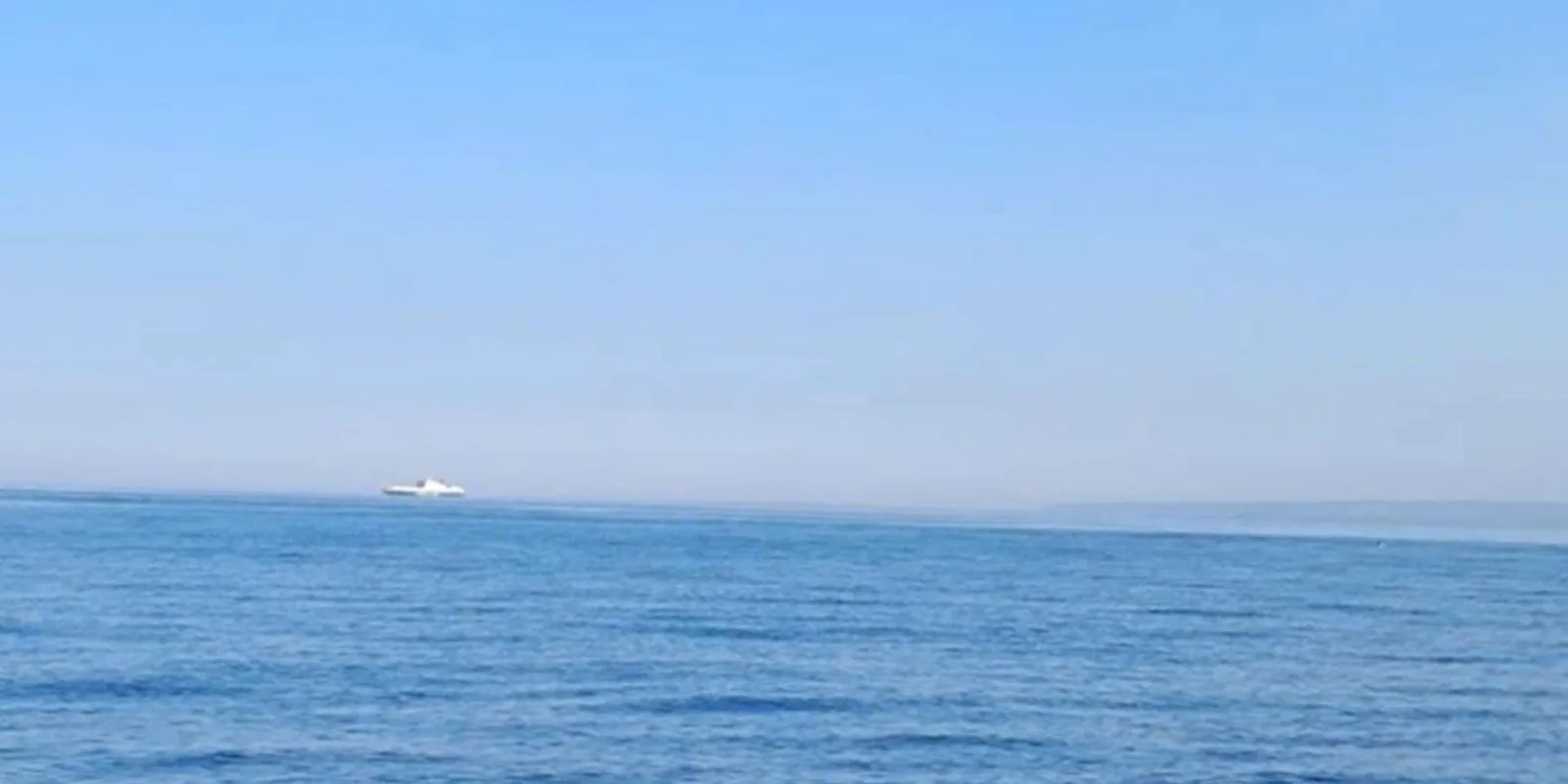 Catania: Boat tour to Aci Trezza with the chance to see dolphins